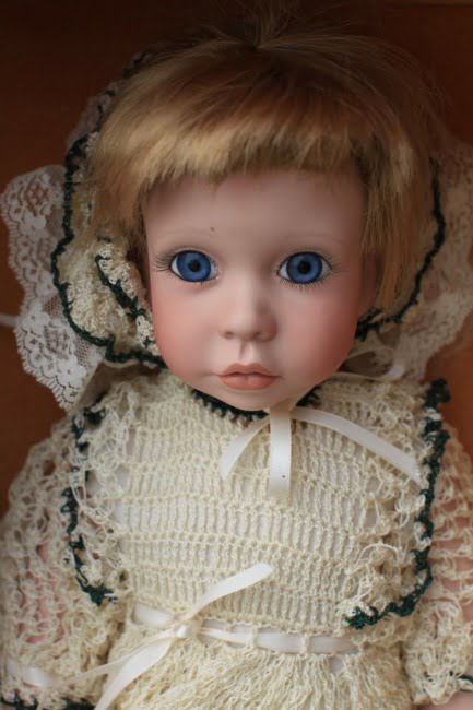 Creepy Doll With Big Blue Eyes